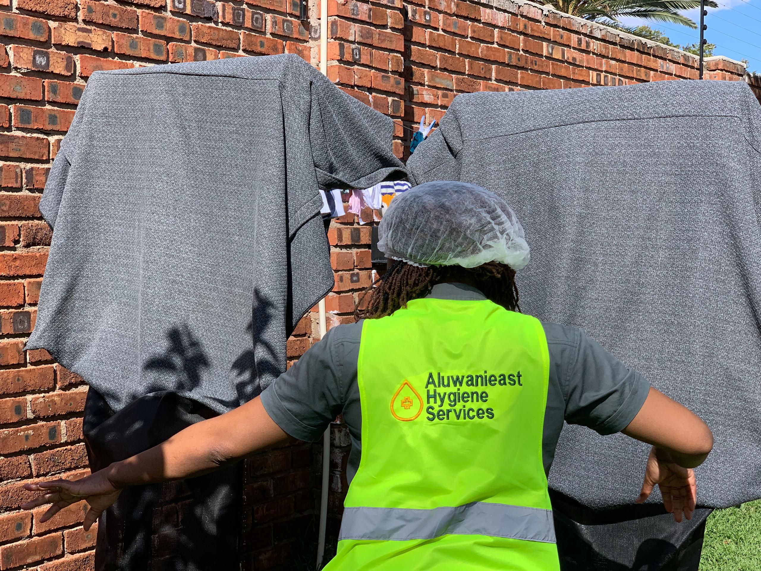 Aluwanieast Hygiene Services professional cleaning team with company branding